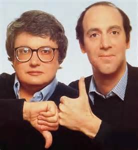 Siskel and Ebert, flashing their trademark "thumbs"