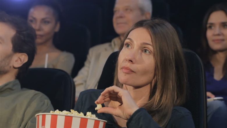 woman-not-laughing-movie-theater